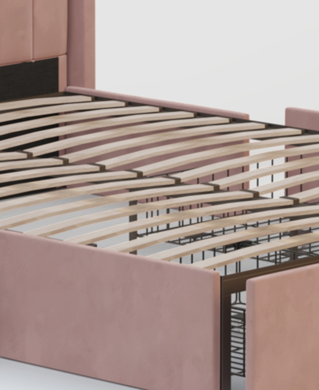 The fully assembled pink bed is without a mattress, thus displaying the flexible slatting and metal frame elements.