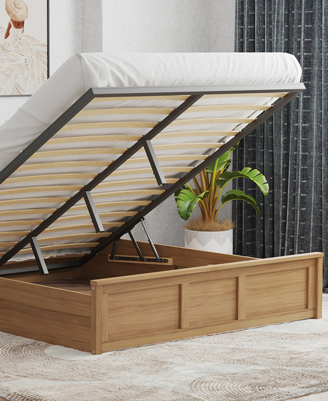 The timber bed is shown with a mattress on top, which is elevated on its slats to reveal storage space beneath. The timber bed is shown with a mattress on top, which is elevated on its slats to reveal storage space beneath.