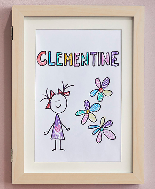 A colourful line drawing of a figure and flowers, with the name 'Clementine' above, is on a wall in a natural timber frame.