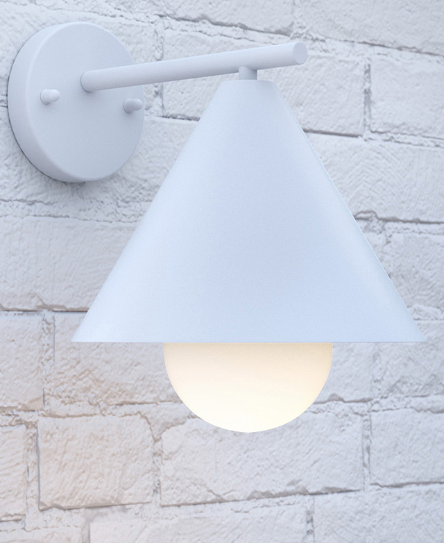 The white cone-shaped wall light is illuminated on a white brick wall.