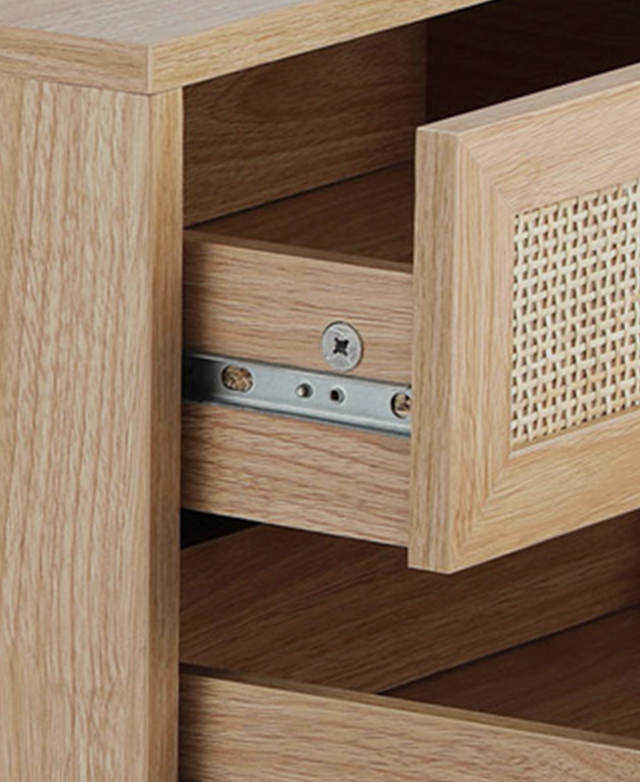 The side table's drawers are open, with the top one's silver metal runner shown.
