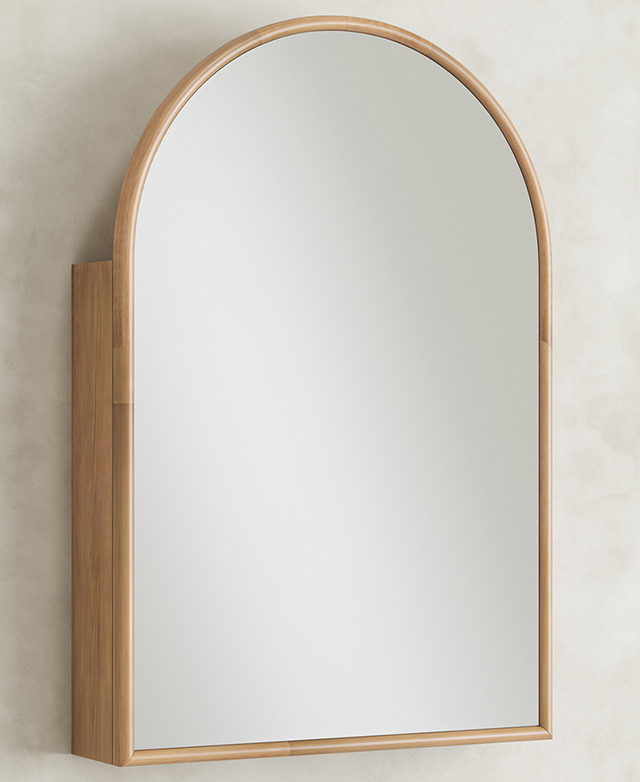 The full arch-shaped mirror is hung on a concrete-look wall. The full arch-shaped mirror is hung on a concrete-look wall.