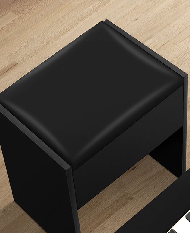 The black stool has a smooth faux leather upholstered seat.