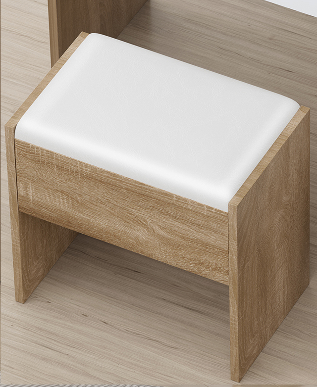 The blocky stool design has a white seat that's upholstered with white faux leather.