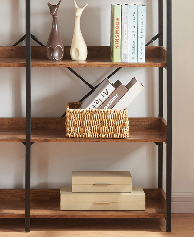 The bottom half of the bookshelf is shown front-on, with shelves filled with decor and books. The bottom half of the bookshelf is shown front-on, with shelves filled with decor and books.