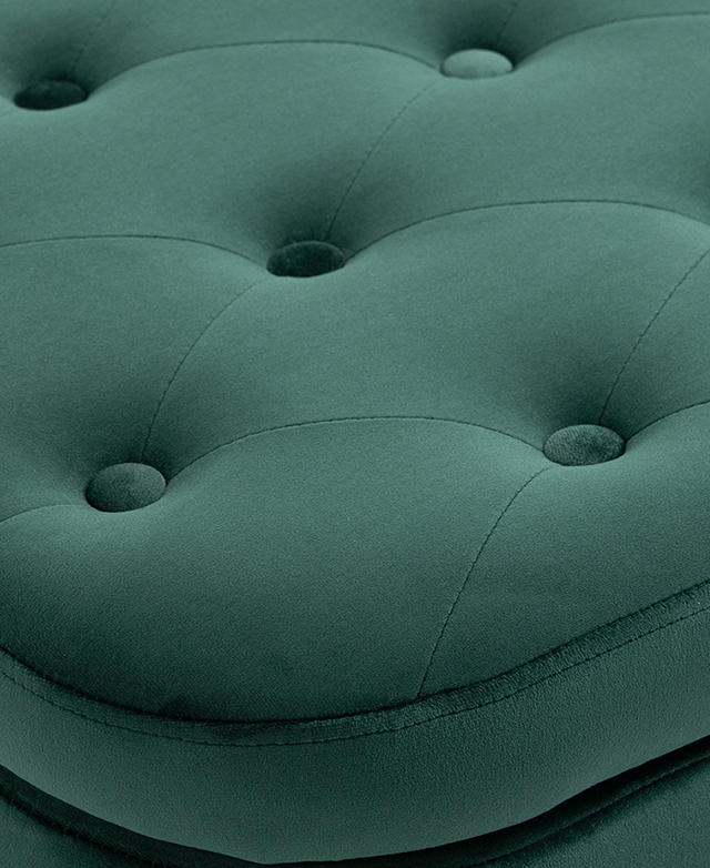 Button tufting a piping trims adorn the top of the green velvet ottoman. Button tufting a piping trims adorn the top of the green velvet ottoman.