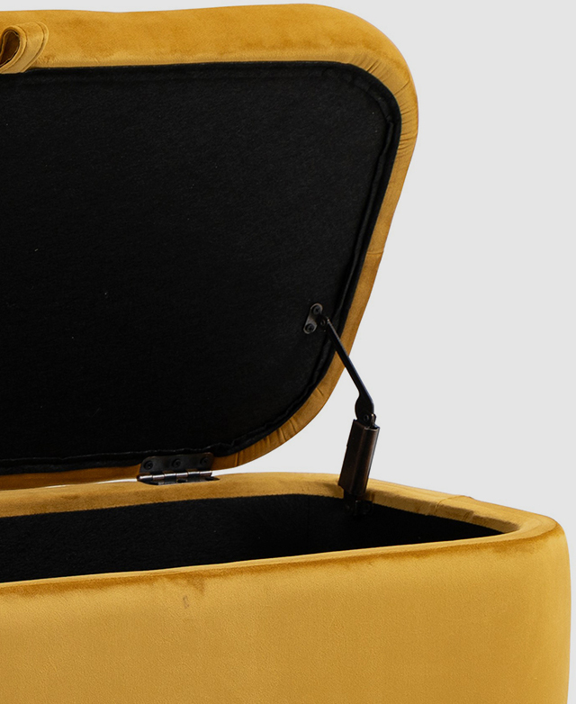 The lid is lifted on hinges of the yellow ottoman. The lid is lifted on hinges of the yellow ottoman.