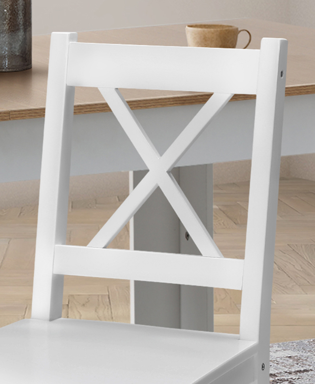 Crossback detail of the white dining chair. Crossback detail of the white dining chair.