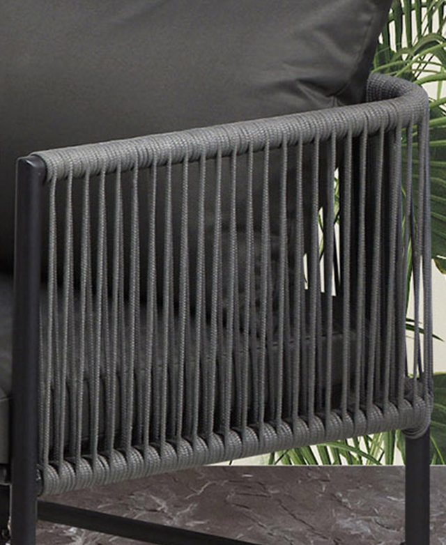 Grey polyester rope is wrapped around the outdoor chair to form the arms and backrest. Grey polyester rope is wrapped around the outdoor chair to form the arms and backrest.