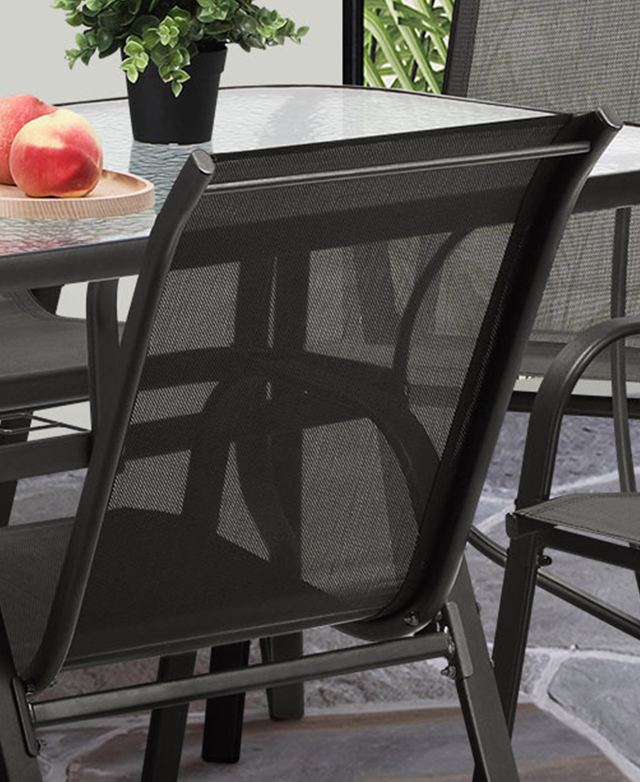 A chair is shown from behind to highlight the translucent Textilene material that forms the back and seat.
