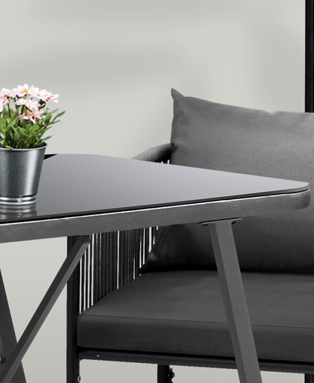 Crisp, dark tempered glass with rounded corners sits neatly atop a metal frame. Crisp, dark tempered glass with rounded corners sits neatly atop a metal frame.