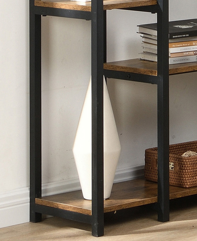 Strong, sturdy black metal frame is in focus, while shelves are shown with decorative items on them.