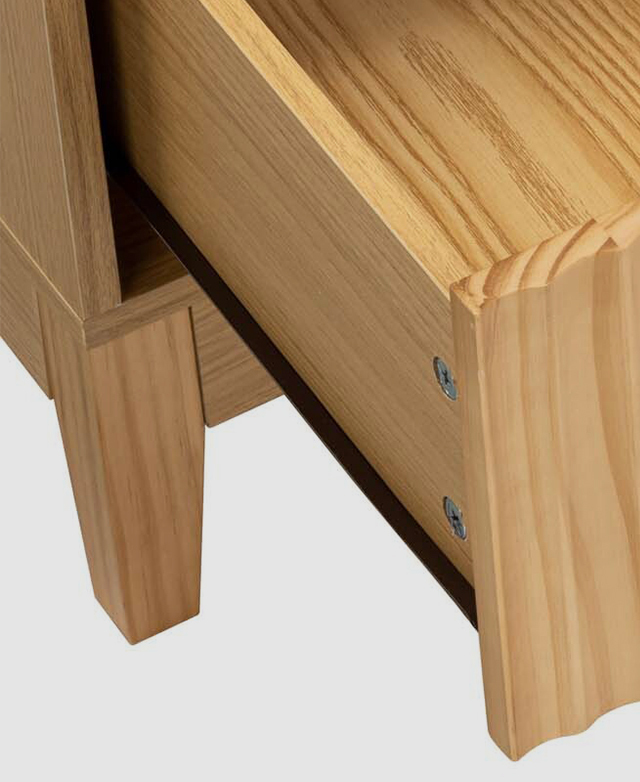 Internal aspects of the drawer are displayed where the wood grain is distinct and a metal runner is shown.