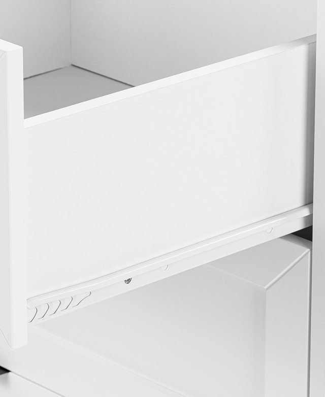 An open drawer features a strong metal runner, also in white, for a seamless look. An open drawer features a strong metal runner, also in white, for a seamless look.