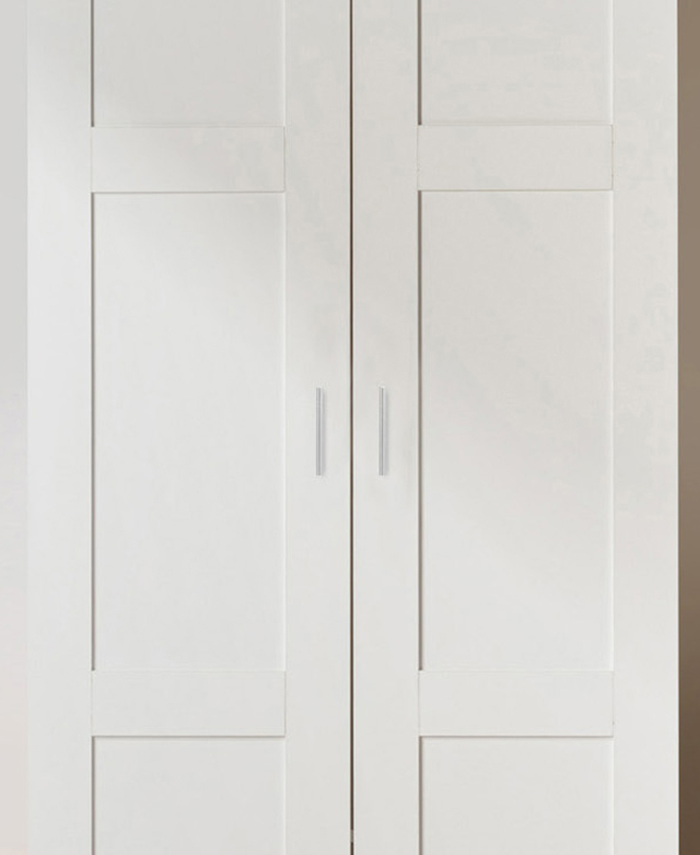 Cropped view shows the panelled detail of the white shaker-style cupboard fronts. Cropped view shows the panelled detail of the white shaker-style cupboard fronts.