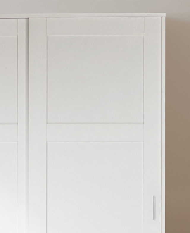 Cropped view shows the panelled detail of the white shaker-style cupboard fronts. Cropped view shows the panelled detail of the white shaker-style cupboard fronts.