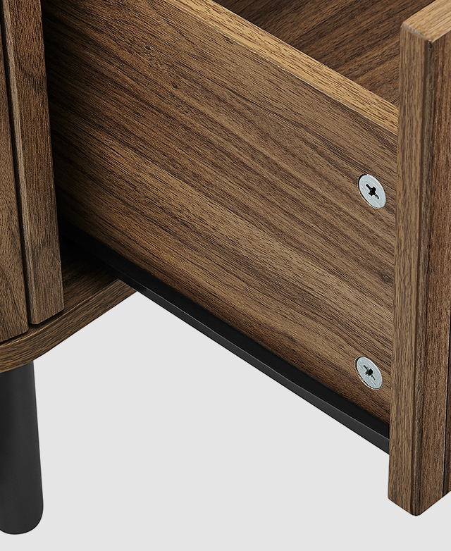 An open drawer features a strong metal runner. An open drawer features a strong metal runner.