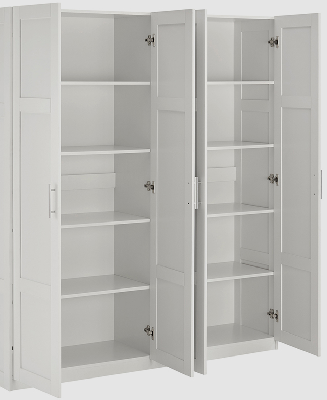 All of the doors of the white cupboard are open to reveal generous shelving space.