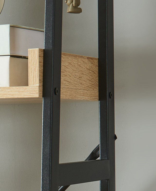 Angled view of the black metal frame highlights its clean lines and simplicity.