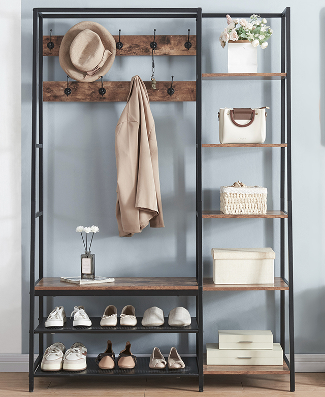 A front-on view of the large hall tree displays several items on the hooks and shelves, including a jacket, hat, and shoes.