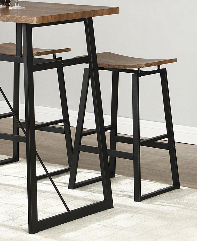 The bar table and bar stool set has angular, black iron bases on a cream tiled floor. The bar table and bar stool set has angular, black iron bases on a cream tiled floor.