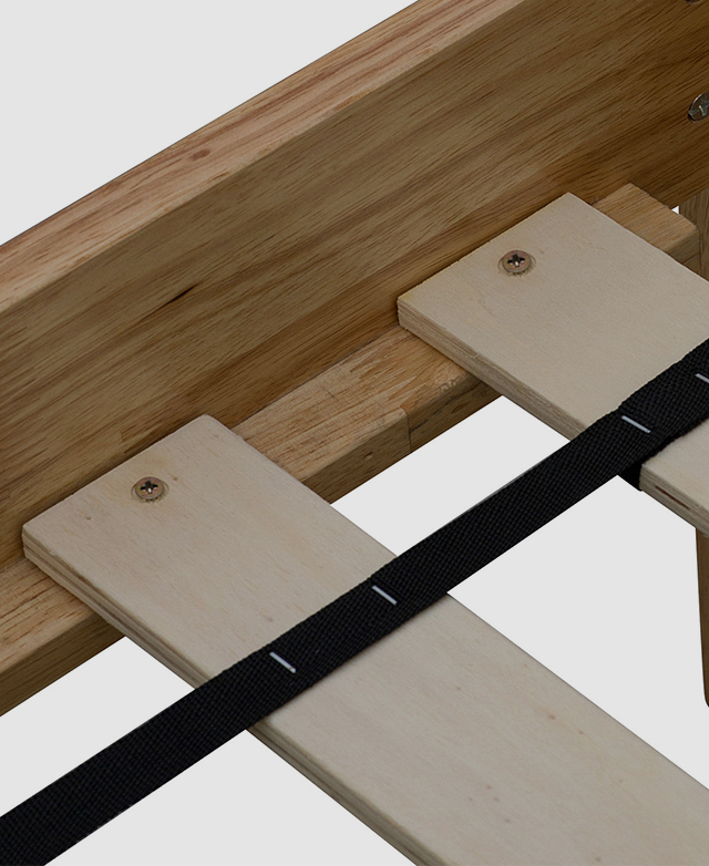 Broad laminated veneer lumber slats are held together with nylon material so they're evenly spaced.
