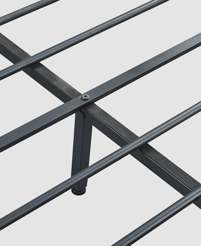 Close-up of the tube slatting and the angular metal support beams.