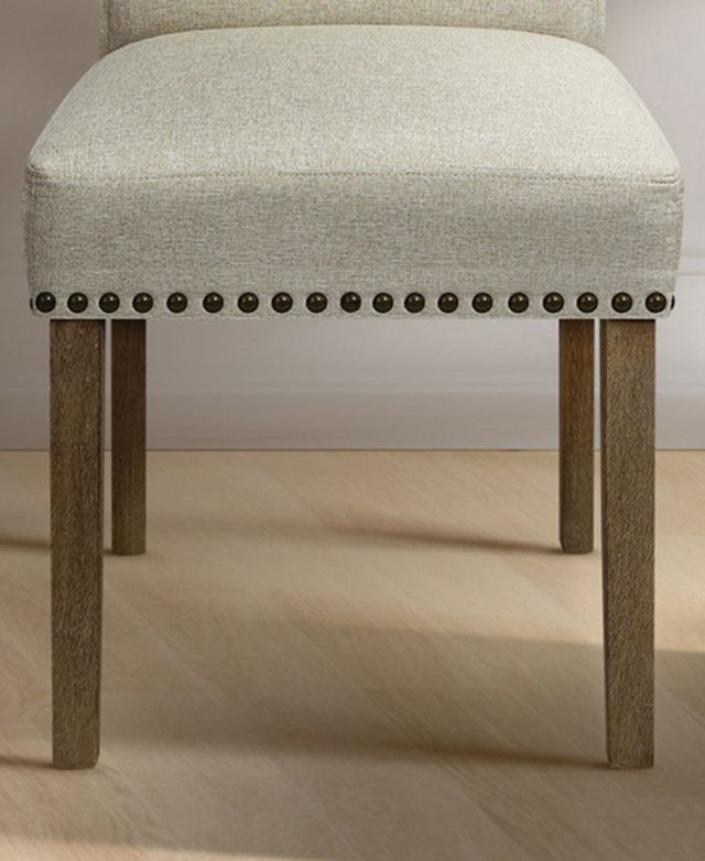 Dining chair legs are slender but blocky, in a medium ash wood colour. Dining chair legs are slender but blocky, in a medium ash wood colour.