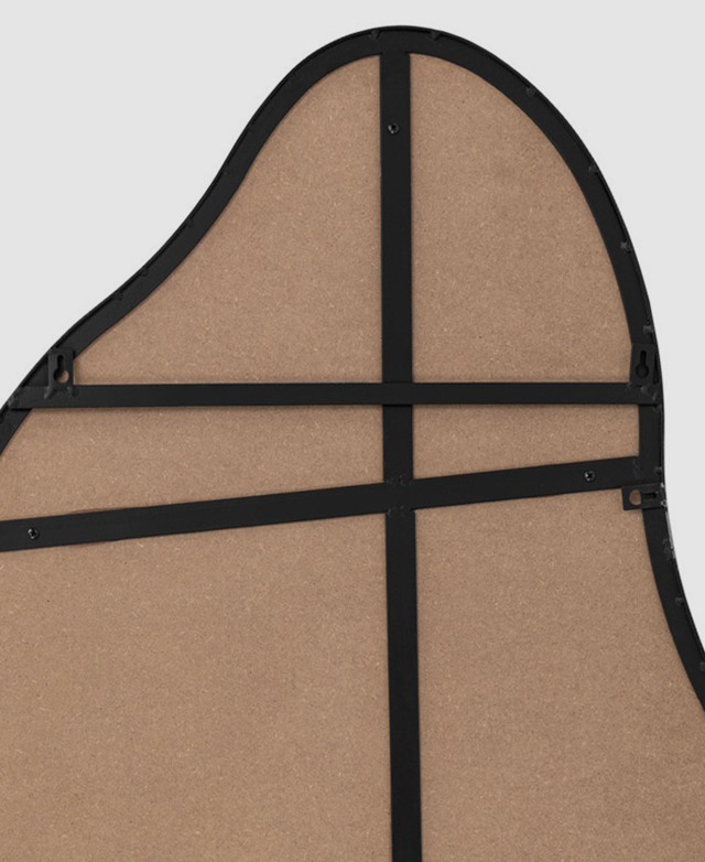 The back of the mirror shows the metal frame and the support bars, plus the several metal hanging hooks. The back of the mirror shows the metal frame and the support bars, plus the several metal hanging hooks.