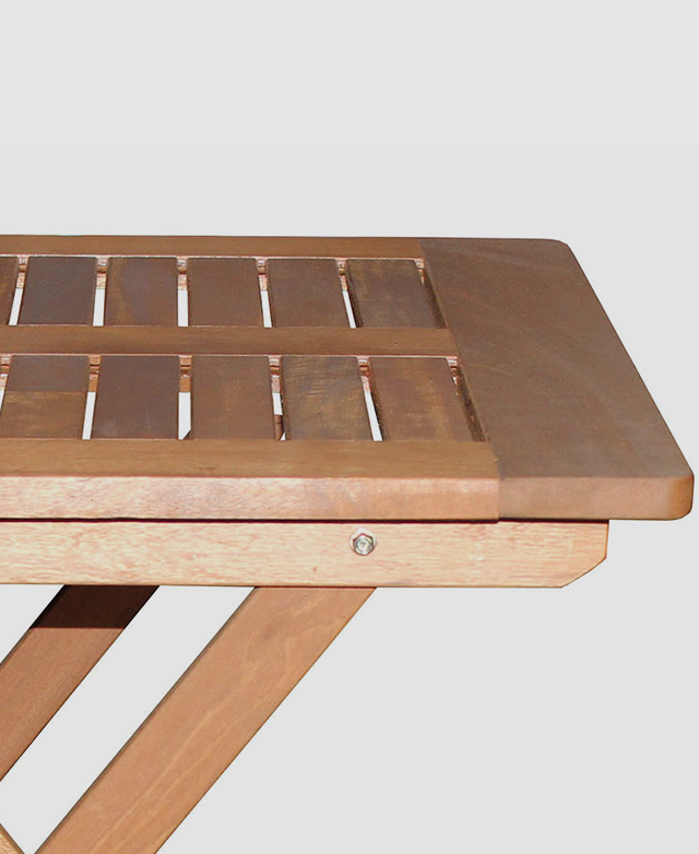 The outdoor timber table's top is shown to highlight its rounded corners and slatted top. The outdoor timber table's top is shown to highlight its rounded corners and slatted top.