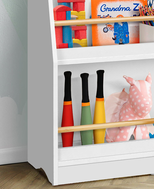 The shallow shelves feature a timber safety bar to keep the colourful books and toys in place. The shallow shelves feature a timber safety bar to keep the colourful books and toys in place.