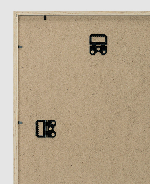 Black metal hooks on the back highlight how the frame can be hung both vertically and horizontally.