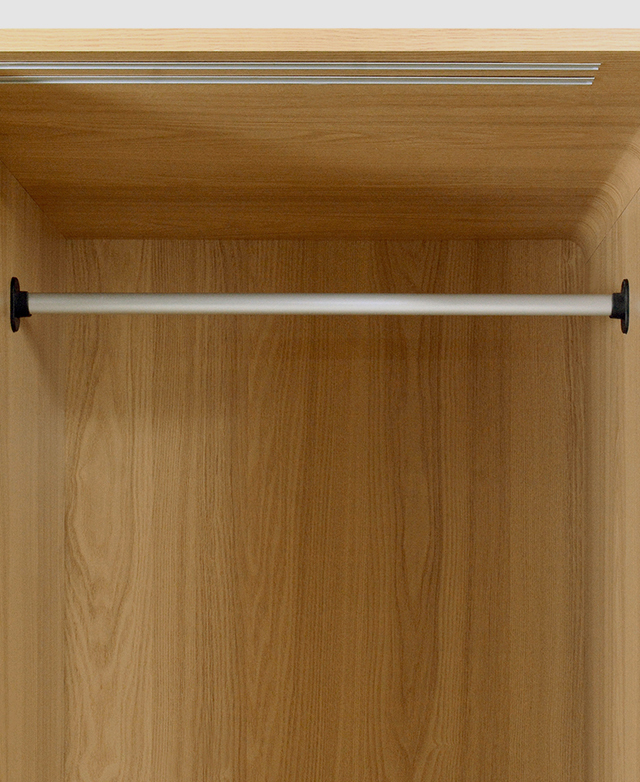 Cropped view draws attention to the metal hanging rail. Cropped view draws attention to the metal hanging rail.