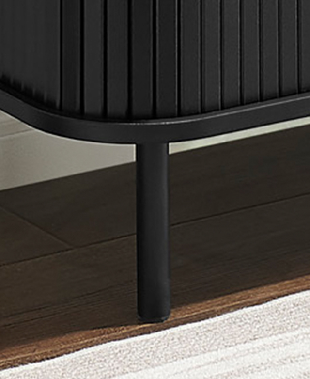 Slender black steel legs support the cabinet. Slender black steel legs support the cabinet.