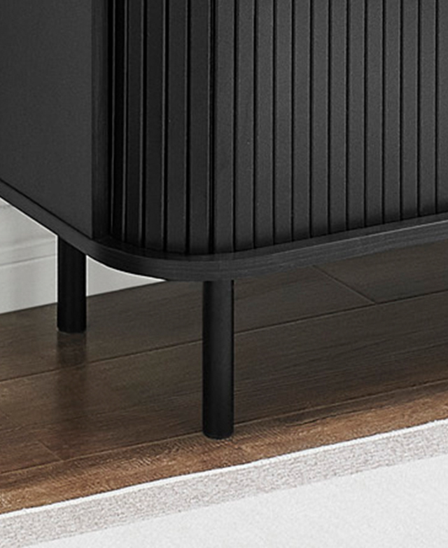 Slender black steel legs support the bookcase. Slender black steel legs support the bookcase.