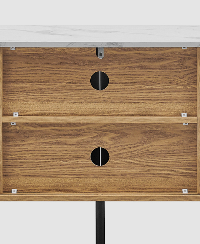 The back of the TV unit has two cable holes cut in the back.