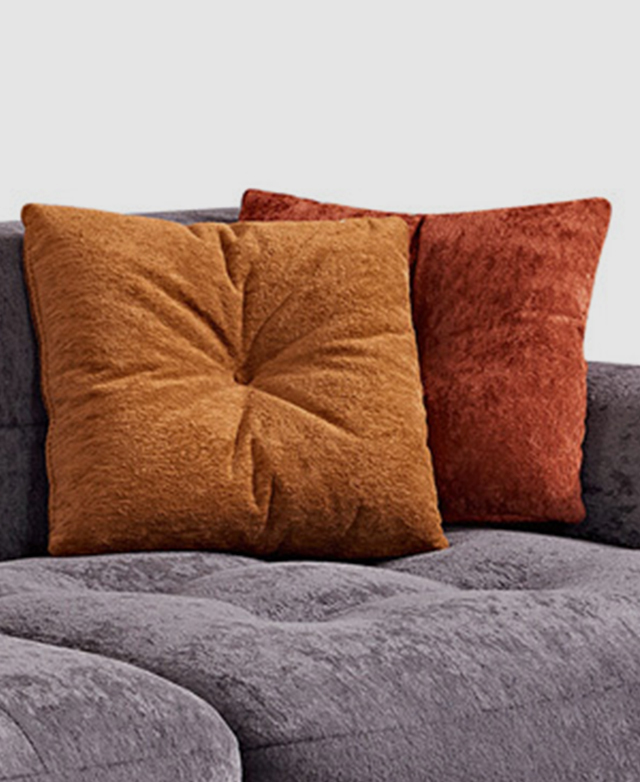 Contrasting throw cushions