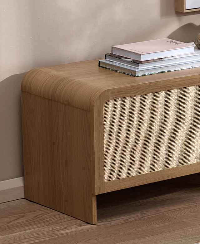 The waterfall edge of one end of the TV unit is demonstrates the modern feel.