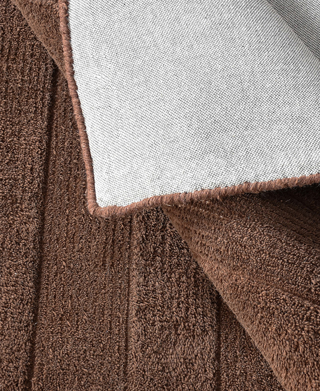 Tactile, cushioned surface