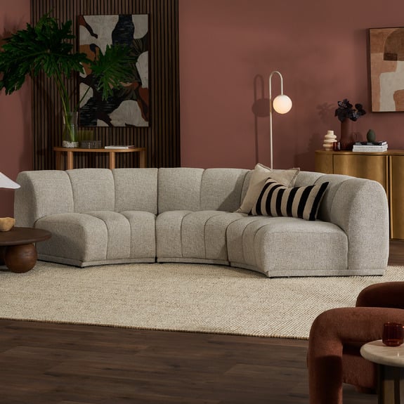 Arco Curved 4 Seater Modular Sofa in a large living room